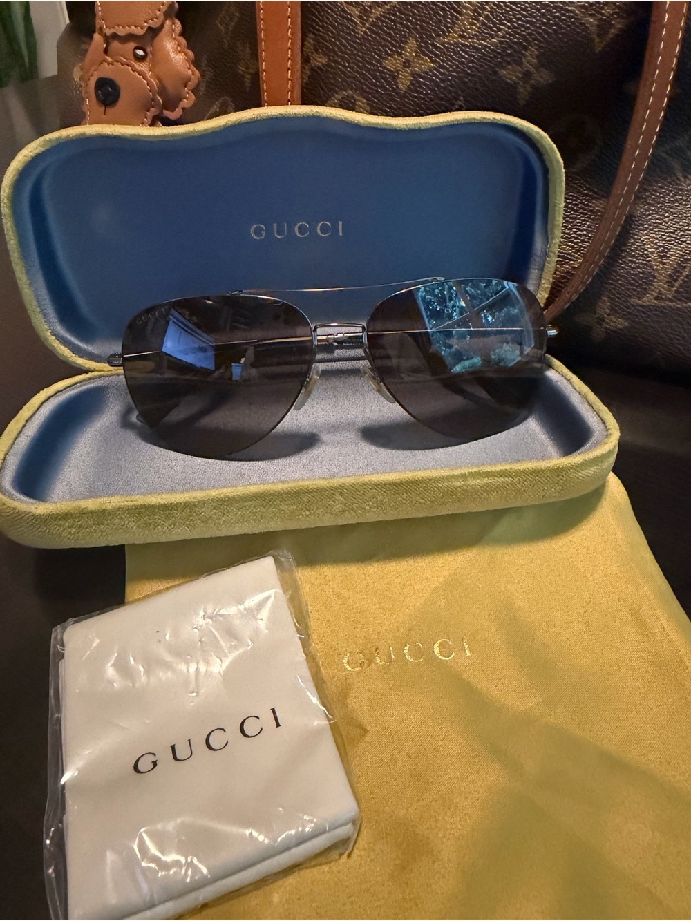 Gucci Aviator Sunglasses with Black Lenses